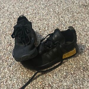 Black Sneakers with Gold Accents